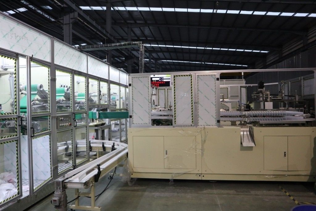 Mitsubishi PLC 0.8Mpa 350pcs/min Lady Menstrual Pad Making Machine